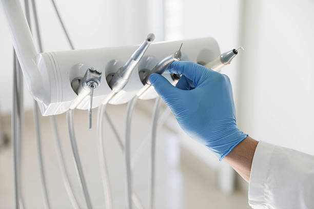 Professional Teeth Whitening technician working in Roslyn Estates, NY
